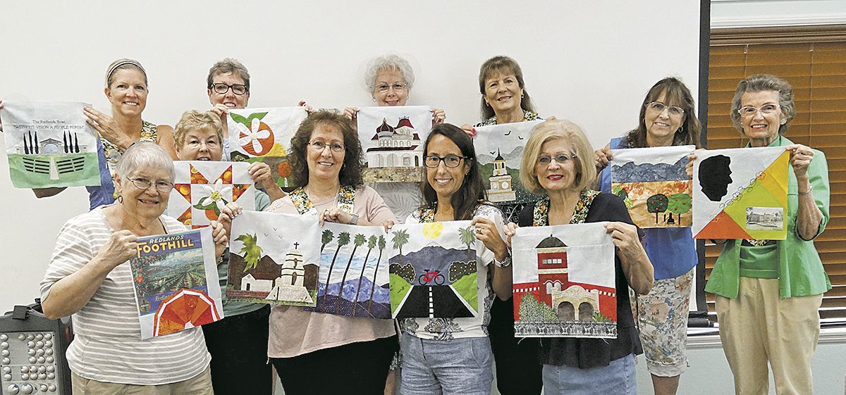 Redlands quilters with their blocks